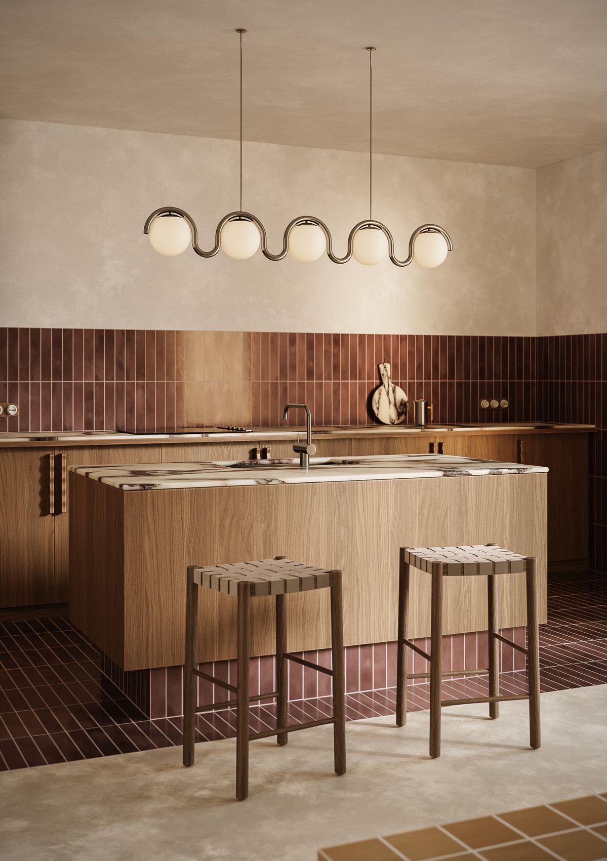 Warm oak kitchen with terracotta tile and marble island designed with Ludwig