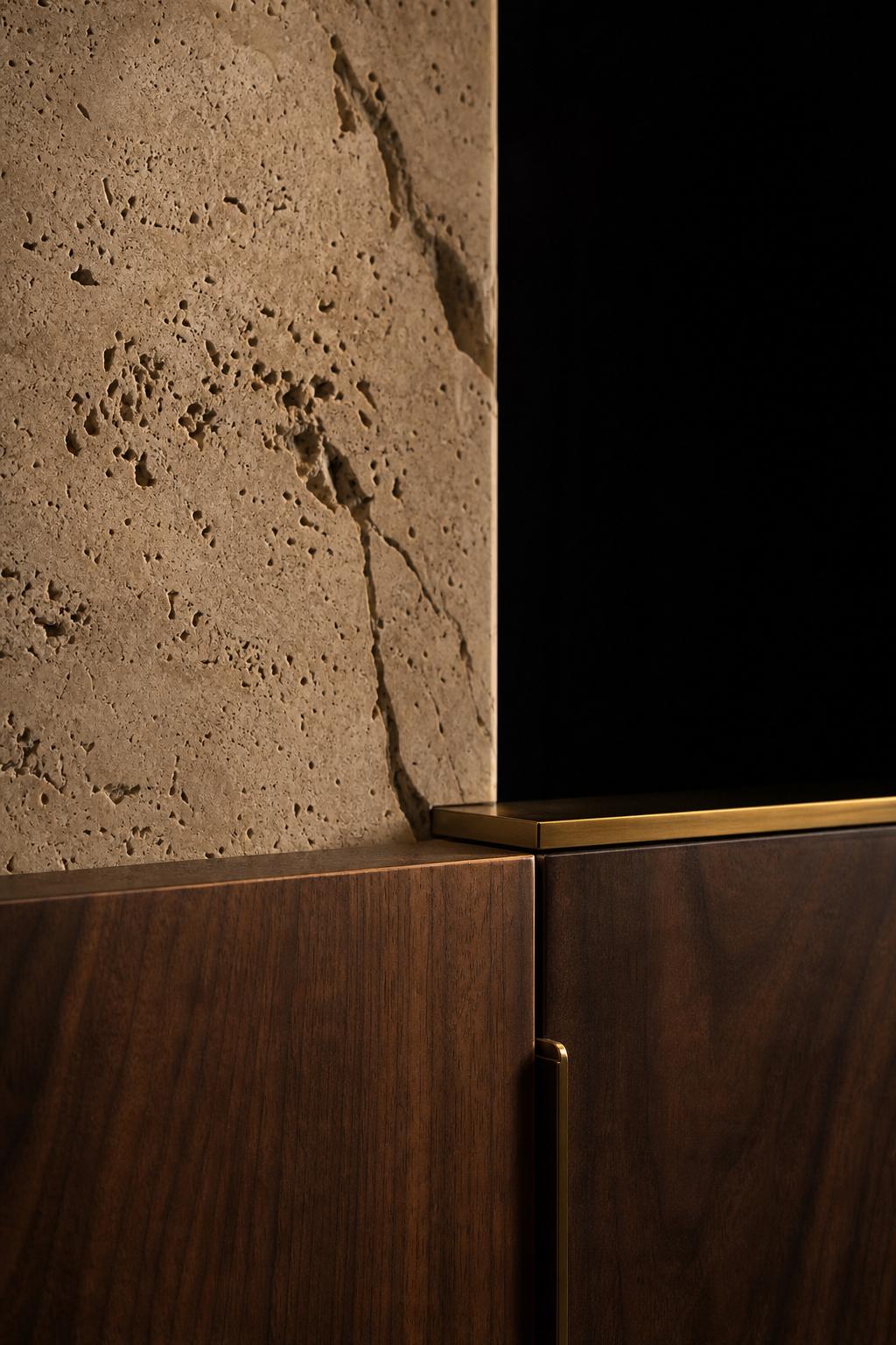 Macro of travertine stone and dark walnut grain with brass accents